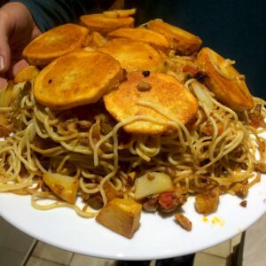 Potato tahdig on spaghetti