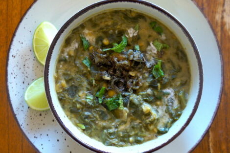 Ash-e Sak served with lime wedges